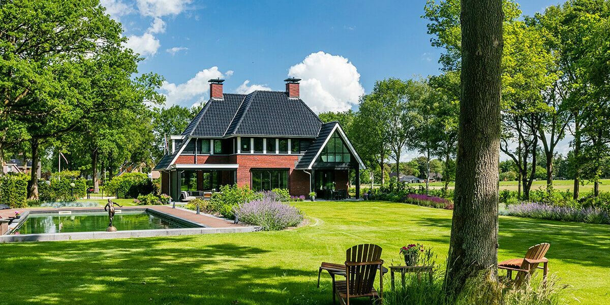 villa bouwen - Villa op de Hondsrug - zitje achterin de tuin - Lichtenberg Exclusieve Villabouw